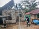 Satgas TMMD Kodim 0317/TBK Pasang Atap Baja Ringan Rumah Warga di Desa Tanjung Hutan